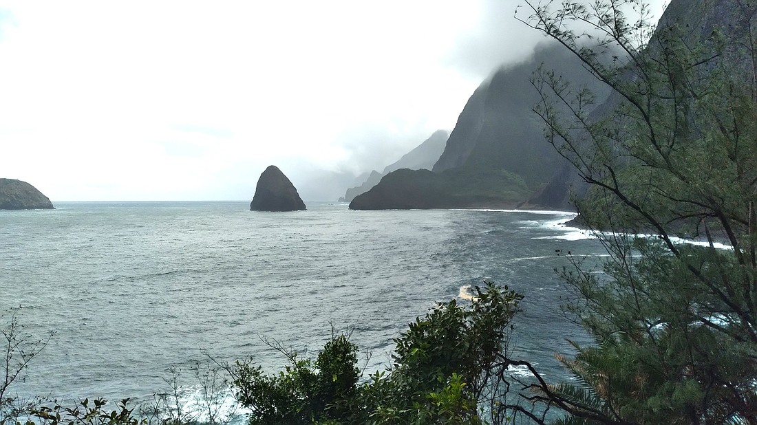 With its towering 3,000 foot cliffs, the arm of land where ships dropped off those afflicted with Hansen's disease is pictured in Kalaupapa, Hawaii, Nov. 21, 2023. Those infected by Hansen's disease, commonly known as leprosy, were forced to walk the narrow piece of land along the shore. (OSV News photo/Naomi Klouda)