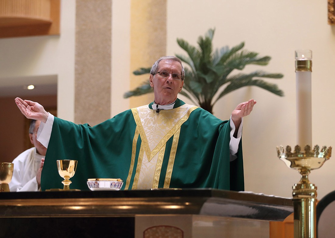In this Monitor file photo from 2016, Msgr. Bacovin is shown celebrating Mass in St. David the King Church, Princeton Junction, one of the parishes he assisted in during his retirement. Msgr. Bacovin died Jan. 24. Funeral arrangements are pending. John Blaine photo