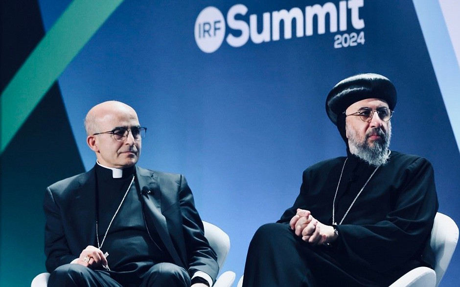 Bishop A. Elias Zaidan of the Maronite Eparchy of Our Lady of Lebanon of Los Angeles, and Coptic Orthodox Archbishop Angaelos of London, listen during a session of the International Religious Freedom Summit in Washington Jan. 30, 2024. (OSV News photo/Matt Ryb, IRF Summit) image cropped