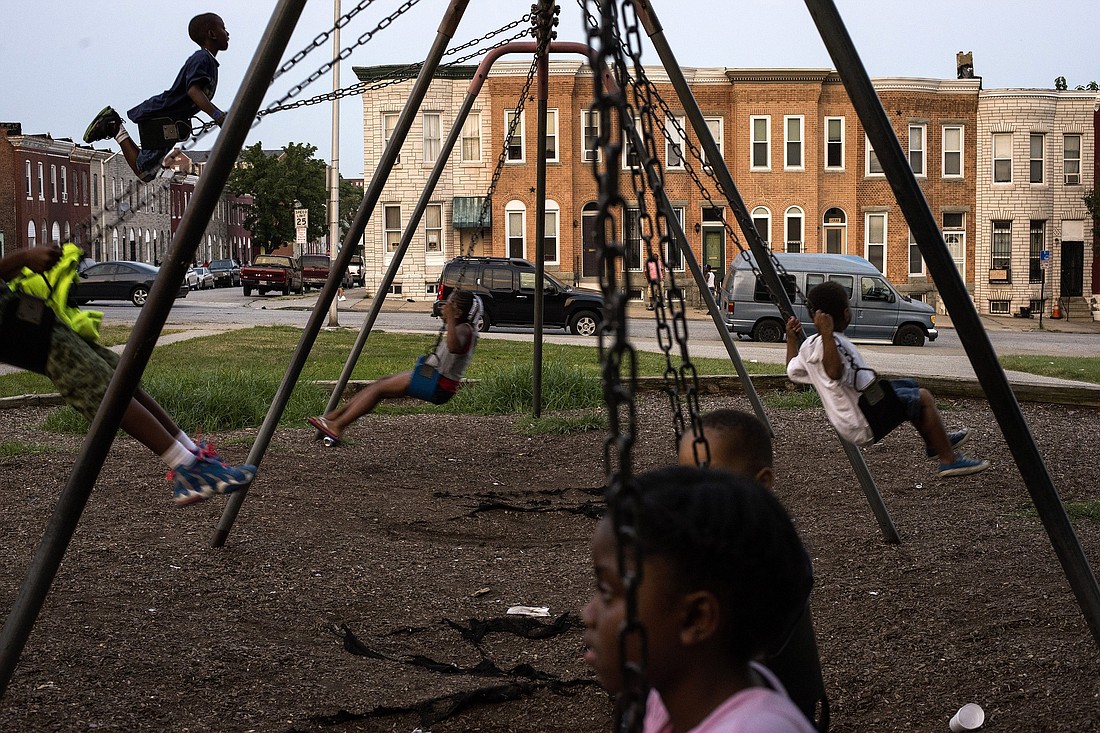 Children are pictured in a file photo playing on swings at a park in Baltimore. On Jan. 31, 2024, the House passed with broad, bipartisan support a $78 billion tax cut package that would enhance the child tax credit for millions of lower-income families. (OSV News photo/James Lawler Duggan, Reuters)