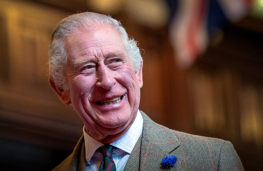 King Charles III visits Aberdeen Town House to meet families who have settled in Aberdeen from Afghanistan, Syria and Ukraine, in Aberdeen, Scotland, Oct. 17, 2022. Buckingham Palace announced Feb. 5, 2024, that the king has been diagnosed with a form of cancer and has begun a schedule of regular treatments. While he has postponed public duties, he "remains wholly positive about his treatment," Buckingham Palace said. King Charles was hospitalized a week earlier for a "corrective procedure" for an enlarged prostate, but the palace said his cancer diagnosis is unrelated to that procedure. (OSV News photo/Jane Barlow, pool via Reuters) Editors: Editorial use only, no commercial use without prior consent.