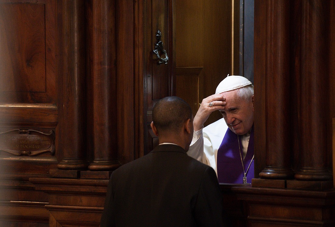 Pope Francis hears the confession of a priest at the Basilica of St. John Lateran in Rome in this Catholic News Service file photo. Father Garry Koch reflects on the healing that coms with the Sacrament of Reconciliation (CNS photo/Vatican Media)