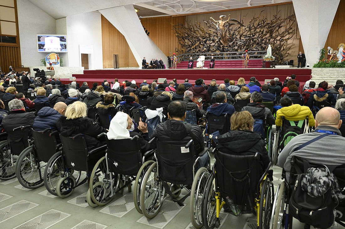 Pope Francis speaks to a delegation from UNITALSI, an Italian Catholic association that organizes pilgrimages for the sick and for people with disabilities, during a meeting in the Paul VI Audience Hall at the Vatican Dec. 14, 2023. (CNS photo/Vatican Media)