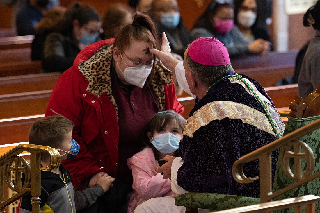 Bishop O'Connell imposes ashes on the forehead of a parishioner of St. Mary of the Assumption Cathedral, Trenton, in this Monitor file photo. For his 2024 Ash Wednesday message, the Bishop speaks about its deep-rooted history and tradition. Mike Ehrmann photo