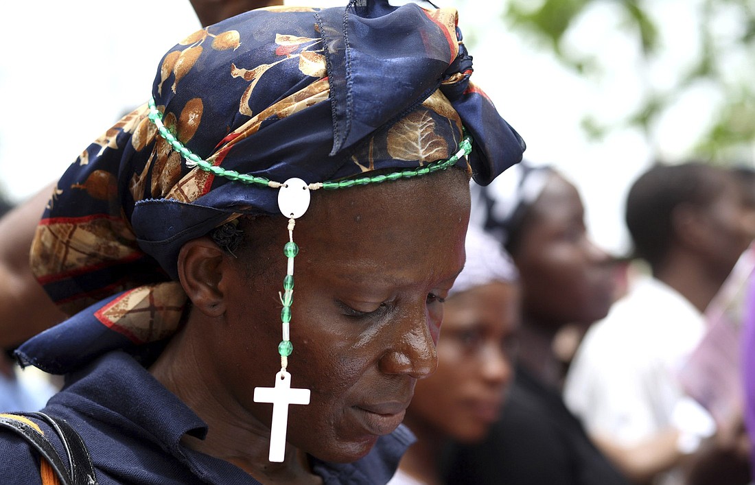 A woman is pictured in a file photo wearing a rosary during a Good Friday procession in Lagos, Nigeria. During an event in the Capitol complex in Washington Jan. 30, 2024, Nigerian Catholic leaders called on the U.S. State Department to designate Nigeria as a "country of particular concern," or CPC, in response to violence in their country perpetuated against predominantly Christian communities. (OSV News photo/Akintunde Akinleye, Reuters)