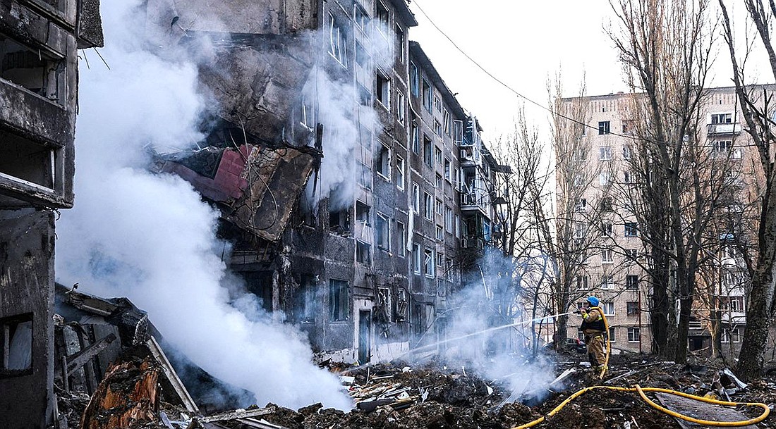 A firefighter works at the site of a residential building in Selydove, in Ukraine's Donetsk region, that was destroyed in a Russian missile attack Feb. 14, 2024. (OSV News photo/National Police handout via Reuters)