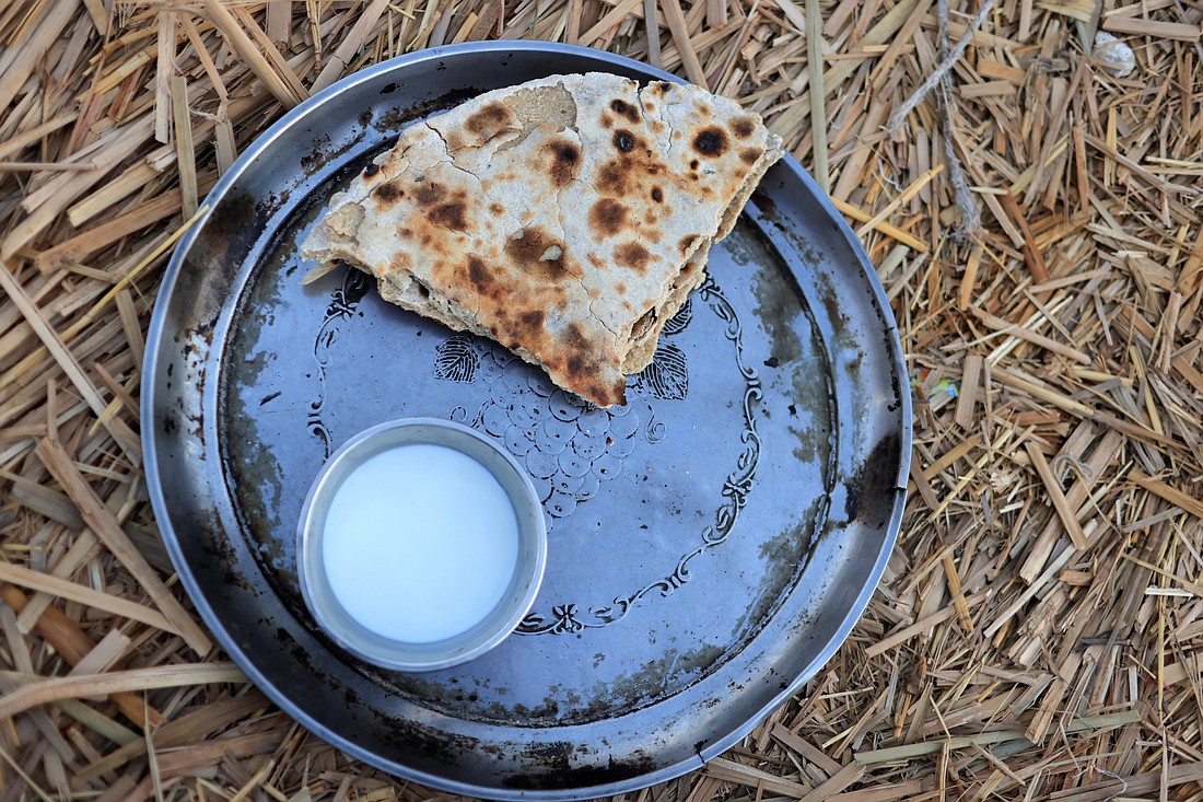 Milk and bread are pictured in an illustration photo. (OSV News photo/Thaier al-Sudani, Reuters)