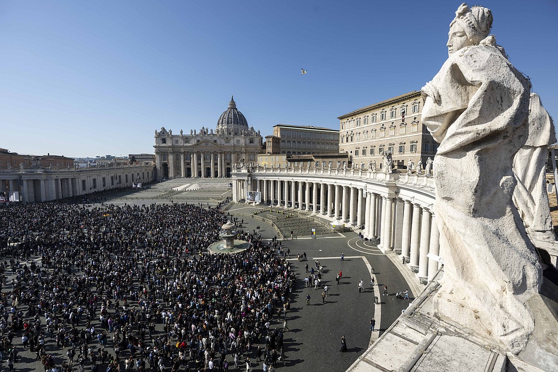 Visitors gather in St. Peter's Square at the Vatican to pray the Angelus with Pope Francis Feb. 18, 2024. (CNS photo/Vatican Media)