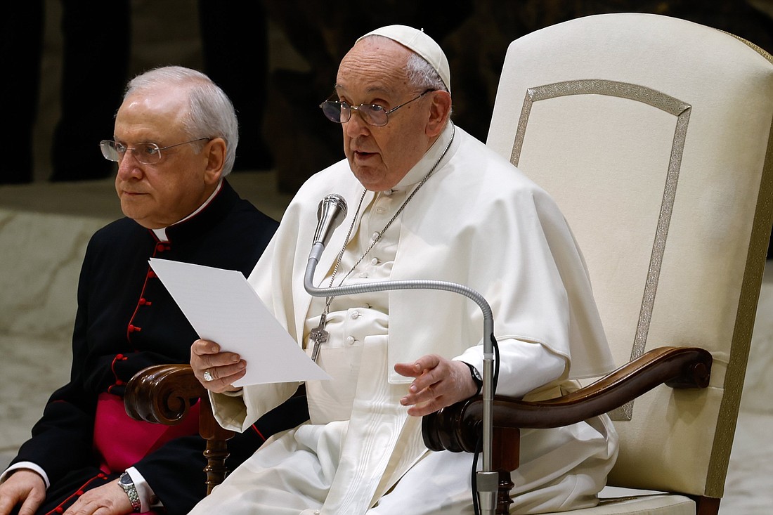 Pope Francis makes brief remarks at the end of his weekly general audience in the Paul VI Audience Hall at the Vatican Feb. 28, 2024, after having an aide read his main text because of persisting cold symptoms. (CNS photo/Lola Gomez)