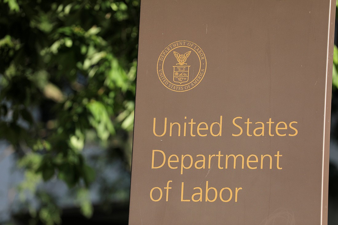 Signage is seen at the U.S. Department of Labor headquarters in Washington Aug. 29, 2020. As child labor law restrictions continue to be loosened around the country, the U.S. Department of Labor announced Feb. 21, 2024, a nationwide, temporary restraining order and injunction against an offender it slammed for "oppressive" and "egregious" practices. (OSV News photo/Andrew Kelly, Reuters)