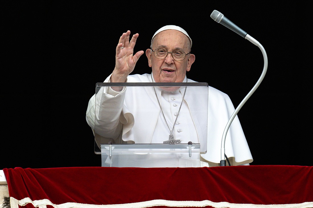 Pope Francis greets visitors gathered in St. Peter’s Square for the recitation of the Angelus at the Vatican March 3, 2024. (CNS photo/Vatican Media)