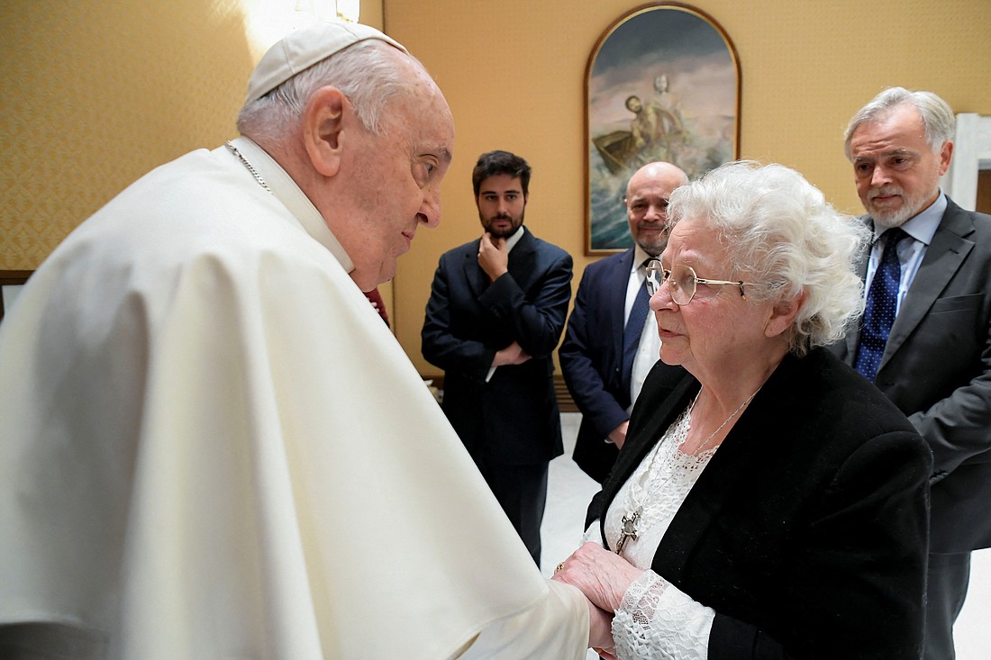 Pope Francis greets Roseline Hamel at the Vatican Dec. 6, 2023. She is the sister of Father Jacques Hamel, the French priest who was murdered while celebrating Mass at his church in Saint-Etienne-du-Rouvray in France's Normandy region on July 26, 2016. (OSV News photo/Vatican Media)