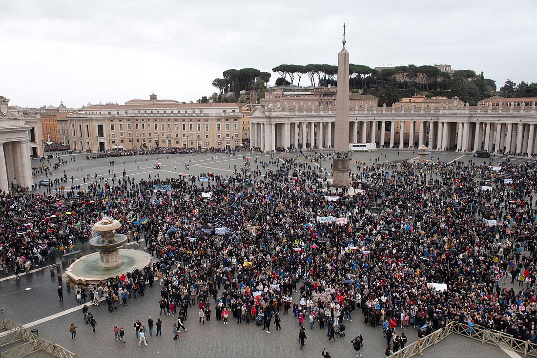 Visitors gather in St. Peter’s Square for the recitation of the Angelus prayer at the Vatican March 10, 2024. (CNS photo/Vatican Media)