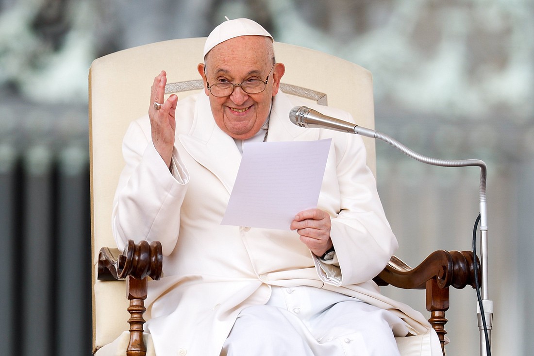 Pope Francis waves to visitors in St. Peter’s Square at the end of his weekly general audience at the Vatican March 13, 2024.  An aide read his main speech due to the pope's persisting cold symptoms. (CNS photo/Lola Gomez)