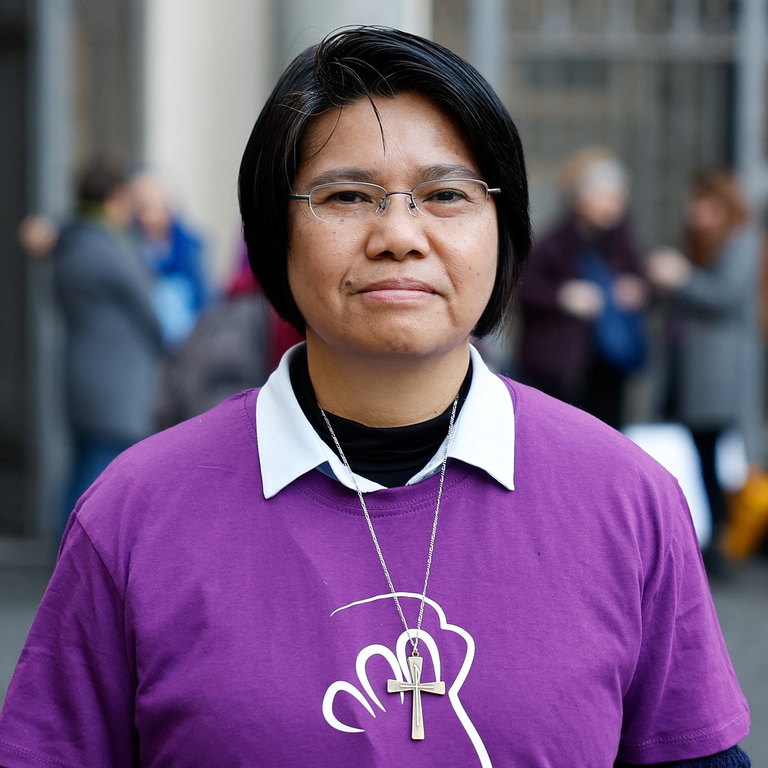 Maryknoll Sister Abby Avelino poses for a photo in Rome's central Santa Maria in Trastevere Square Feb. 6, 2024. She is the international coordinator of Talitha Kum, an international network of religious working against human trafficking, and spoke at a March 6, 2024, webinar on human trafficking that was sponsored by Georgetown University's Institute on Catholic Thought and Public Life. (CNS photo/Lola Gomez)