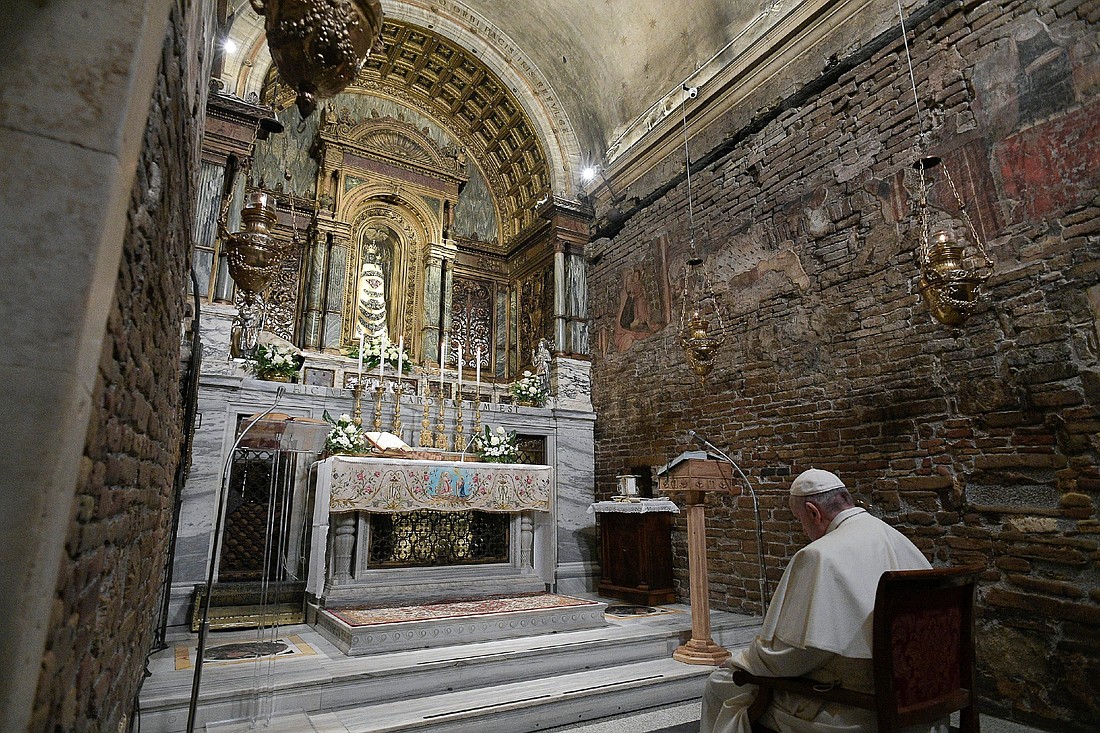 Pope Francis prays inside the Sanctuary of the Holy House on the feast of the Annunciation in Loreto, Italy, March 25, 2019. The solemnity of the Annunciation is celebrated on March 25 -- unless it's not, which is the case this year. (CNS photo/Vatican Media)