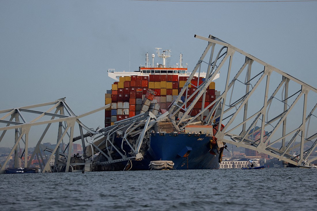 The Dali cargo vessel is pictured March 26, 2024, after it crashed into the Francis Scott Key Bridge in Baltimore causing it to collapse. Archbishop William E. Lori of Baltimore and that city's officials have called for prayers as rescue efforts continued. (OSV News photo/Julia Nikhinson, Reuters)