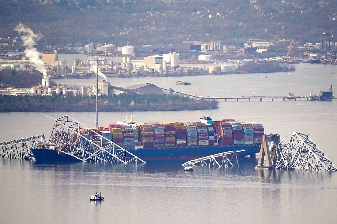 The Dali cargo vessel is pictured March 26, 2024, after it crashed into the Francis Scott Key Bridge in Baltimore causing it to collapse. Archbishop William E. Lori of Baltimore celebrated a Mass of healing later that day at the Cathedral of Mary Our Queen for those impacted by the collapse. OSV News photo/Nathan Howard, Reuters