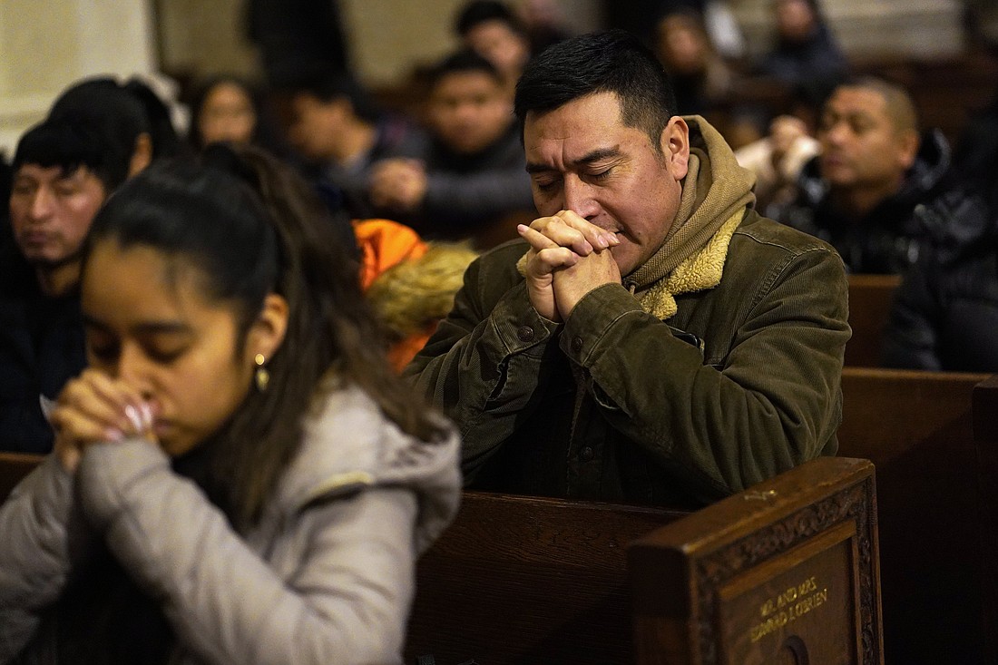 People pray during a special Mass celebrated in honor of the Black Christ of Esquipulas, Guatemala, Jan. 7, 2024, at St. Patrick's Cathedral in New York City. Results of a Gallup poll released March 25 showed that regular church attendance in the U.S. continues to decline across the board, particularly among Catholics. OSV News photo/Gregory A. Shemitz