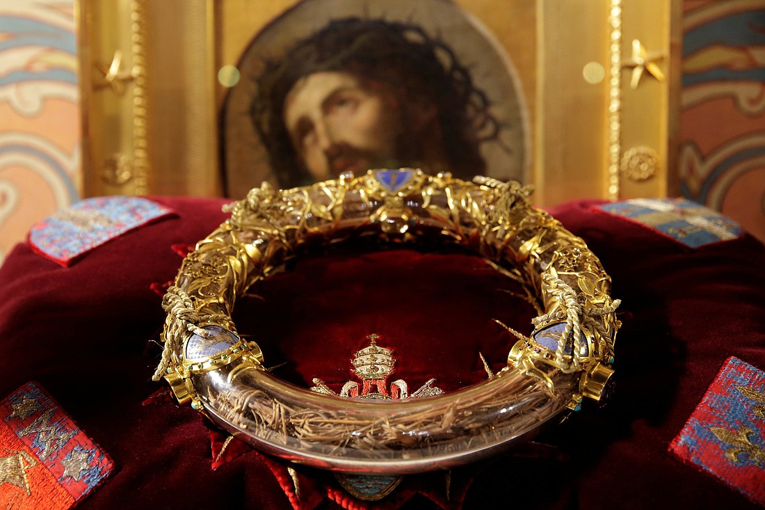 A reliquary containing what tradition holds is Jesus' crown of thorns is displayed during a ceremony at Notre Dame Cathedral in Paris March 21, 2014. The crown, the most precious of the relics in Notre Dame's treasury, was saved from the flames of the April 15, 2019, fire. (OSV News photo/Philippe Wojazer, Reuters)