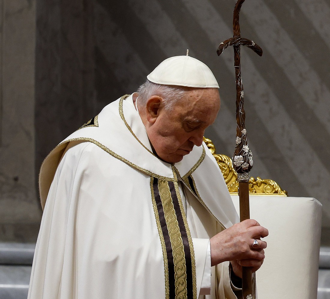 Pope Francis listens to the Gospel reading during his celebration of the chrism Mass in St. Peter's Basilica at the Vatican March 28, 2024. (CNS photo/Lola Gomez)..