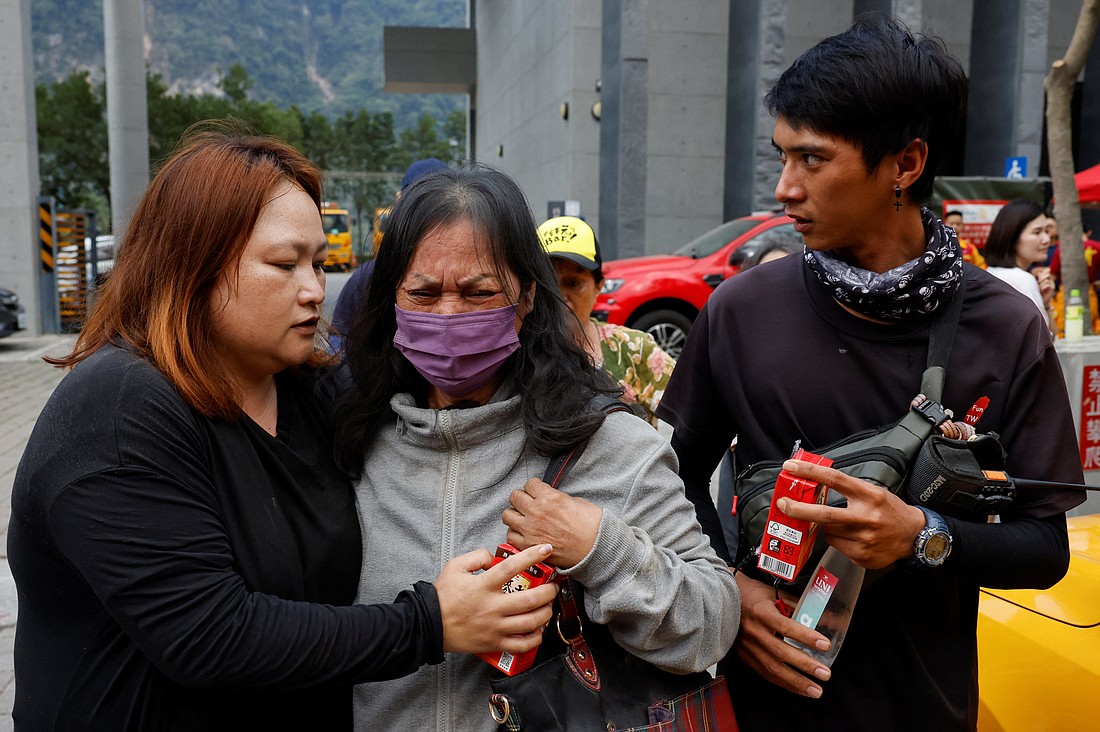 An injured woman is assisted after being rescued from a remote area April 4, 2024, following a 7.4 magnitude earthquake near Hualien, Taiwan. At least nine people died when the quake struck April 3, and more than 1,000 people were injured. According to the BBC, rescuers were working to reach more than 600 stranded people, while dozens of people were still reported missing. (OSV News photo/Tyrone Siu, Reuters).