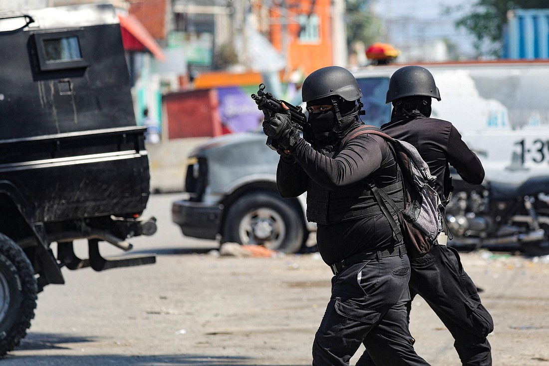 Police officers take part in an operation on the surroundings of the National Penitentiary following a fire in Port-au-Prince, Haiti, March 14, 2024, as a powerful gang leader in Haiti has issued a threatening message aimed at political leaders who would take part in a still-unformed transition council for the impoverished country. (OSV News photo/Ralph Tedy Erol, Reuters)