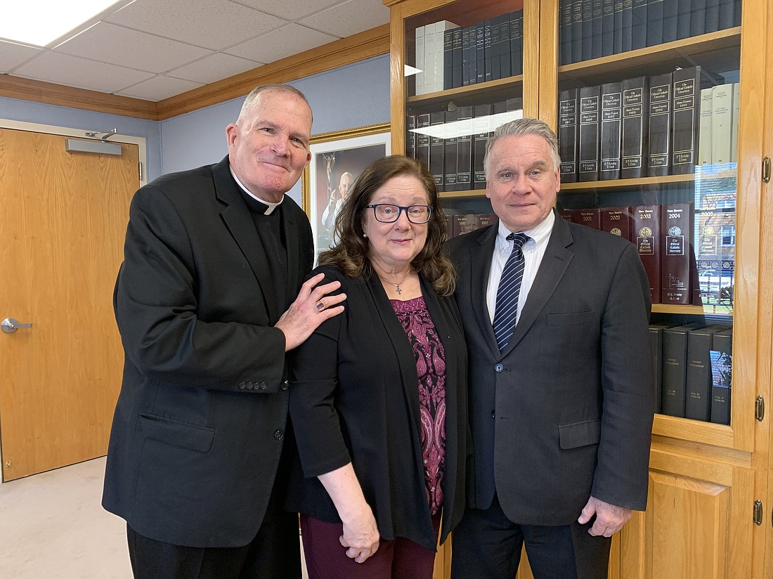 Rep. Chris and Marie Smith capture a moment with Bishop O’Connell during their interview in the diocesan Chancery. EmmaLee Italia photo