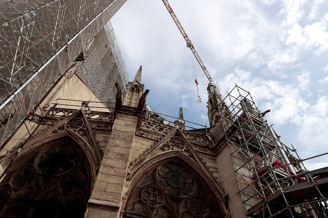 Scaffolding surrounds the Notre Dame Cathedral in Paris July 28, 2022. The cathedral, heavily damaged by a fire April 15, 2019, will reopen to the public and to worship Dec. 8, 2024. (OSV News photo/Geoffroy Van Der Hassel, pool via Reuters)