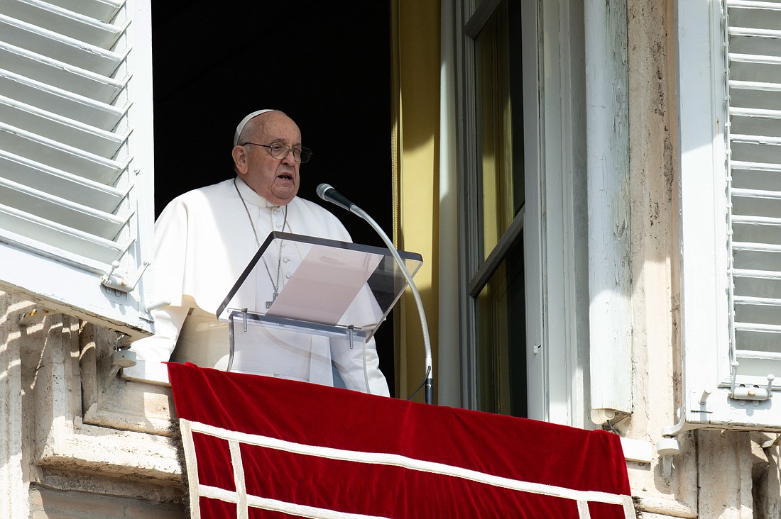 Pope Francis speaks to visitors gathered in St. Peter’s Square to pray the Angelus at the Vatican March 17, 2024. (CNS photo/Vatican Media)