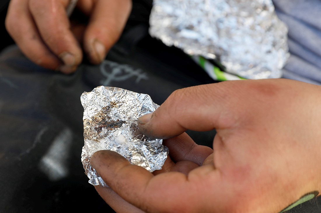 A file photo shows a man who lives on the streets in San Francisco displaying what he says is the synthetic drug fentanyl. Results of a lengthy investigation by a House committee released April 16, 2024, showed that the Chinese government directly subsidizes and encourages manufacturing and export of fentanyl materials, which have wreaked havoc in the U.S. Illicit fentanyl is the leading cause of death for Americans ages 18-45, according to the Centers for Disease Control and Prevention. (OSV News photo/Shannon Stapleton, Reuters)