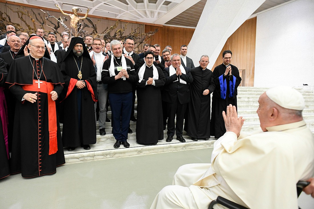 Pope Francis meets with pilgrims from Hungary, including Cardinal Péter Erdo, left, in the Paul VI Audience Hall at the Vatican April 25, 2024. (CNS photo/Vatican Media)