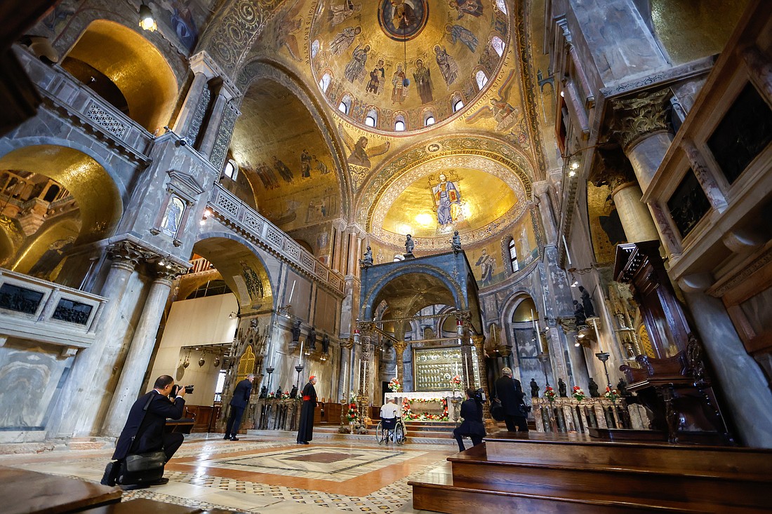 Pope Francis prays in front of the relics of St. Mark the Evangelist in St. Mark's Basilica in Venice April 28, 2024. (CNS photo/Lola Gomez)