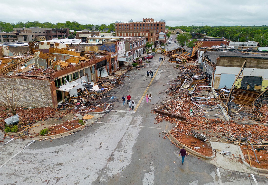 Damaged buildings are seen in Sulphur, Okla., April 28, 2024, after the town was hit by a tornado the night before. Tornadoes killed at least four people in Oklahoma, including an infant, and left thousands without power after a destructive outbreak of severe weather flattened buildings in the heart of the rural town of Sulphur and injured at least 100 people across the state. (OSV News photo/Bryan Terry, The Oklahoman/USA Today Network via Reuters) Editors: EDITORIAL USE ONLY. NO RESALES. NO ARCHIVES. MANDATORY CREDIT.