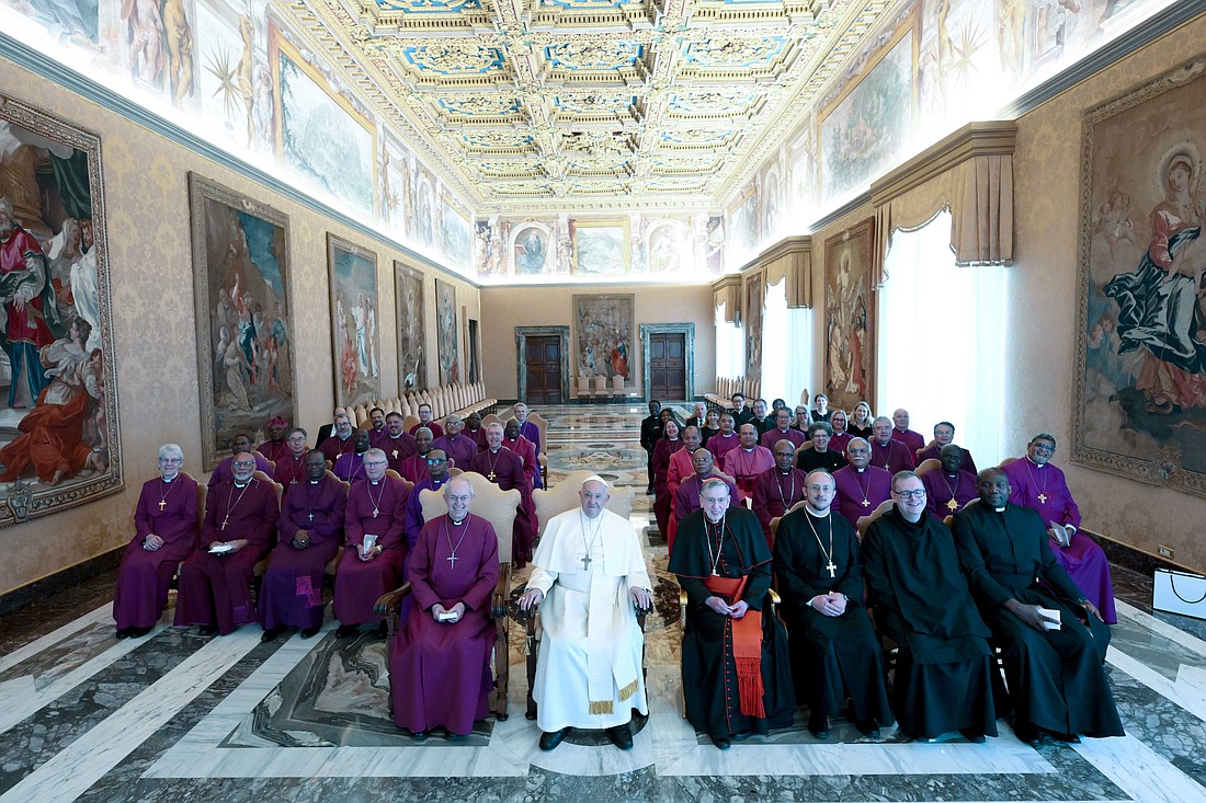 Pope Francis poses for a photo with Anglican Archbishop Justin Welby of Canterbury, left, and Cardinal Kurt Koch, prefect of the Dicastery for Promoting Christian Unity, right, and with Anglican primates who visited the Vatican during their pilgrimage to Rome May 2, 2024. (CNS photo/Vatican Media)