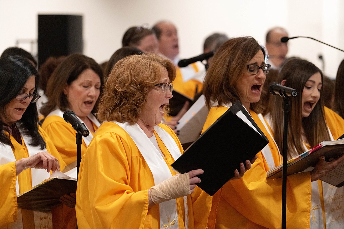 The choir of St. Mary Parish, Middletown, leads the congregation in sung praise during the Easter Vigil Mass. Courtesy photo