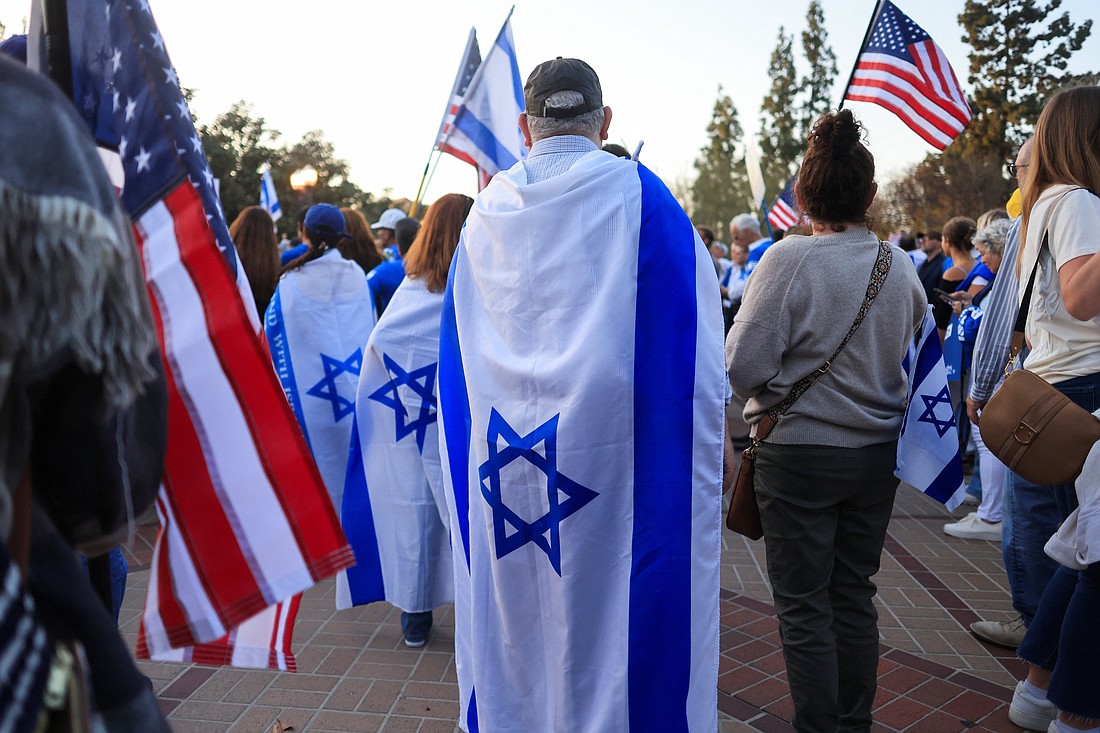 People wear Israeli flags as they participate in a United for Israel March at the University of Southern California in Los Angeles May 8, 2024, during the ongoing conflict between Israel and the Palestinian Islamist group Hamas. (OSV News photo/David Swanson, Reuters)