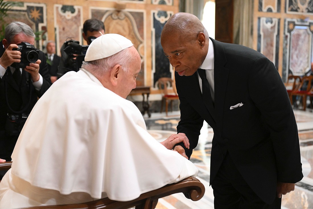 Pope Francis greets New York Mayor Eric Adams during an audience with participants at the World Meeting on Human Fraternity in the Apostolic Palace at the Vatican May 11, 2024. (CNS photo/Vatican Media, via mayor's office Flickr account)