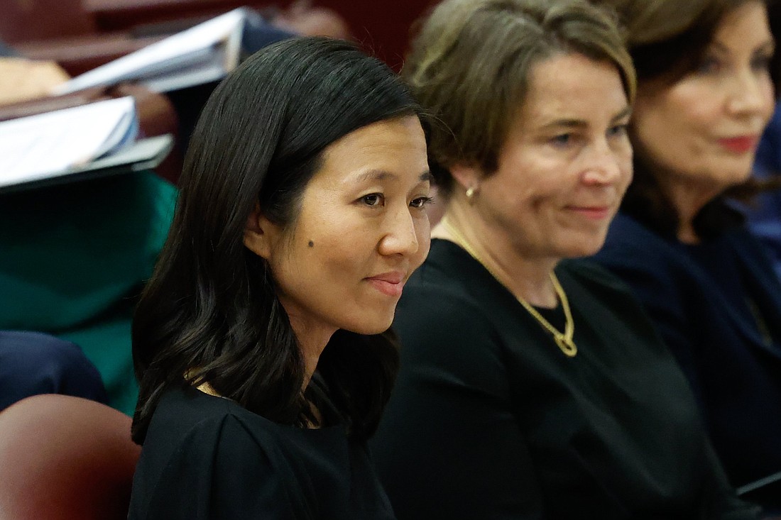 Boston Mayor Michelle Wu, attends a summit, titled “From Climate Crisis to Climate Resilience,” in the synod hall at the Vatican May 16, 2024. Seated to the right is Massachusetts Gov. Maura Healey. (CNS photo/Lola Gomez)