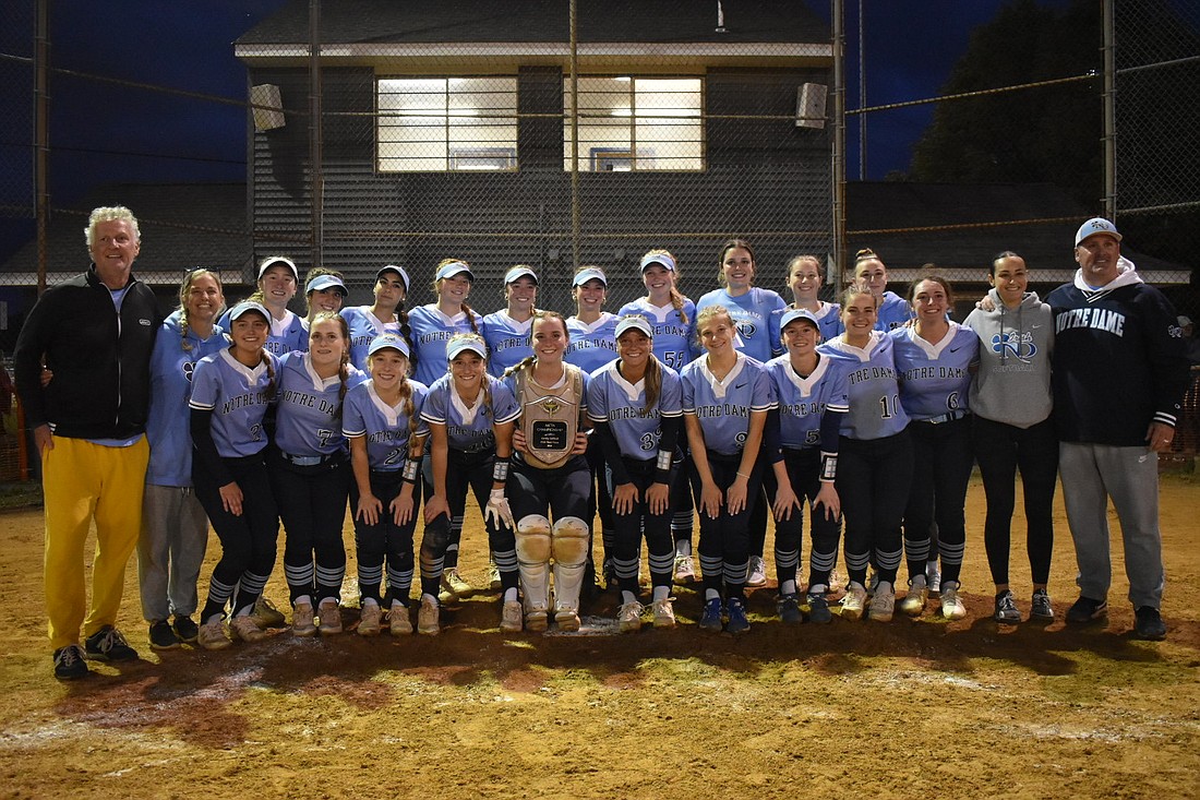 The Notre Dame High softball team was all smiles after winning its second consecutive Mercer County Tournament championship on May 16 with a 2-1 win over Robbinsville. The Irish defeated the Ravens by the same score on the exact same day one year ago. Photo by Emily DiPasquale