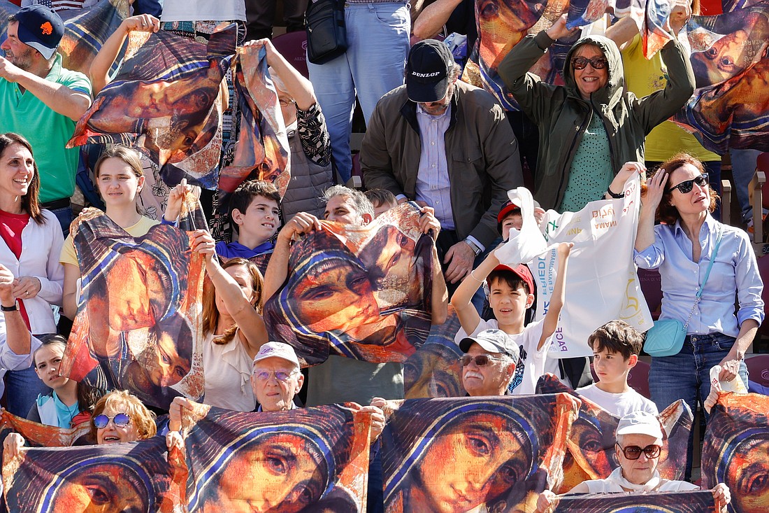 People cheer as Pope Francis arrives at the Arena in Verona May 18, 2024. (CNS photo/Lola Gomez)