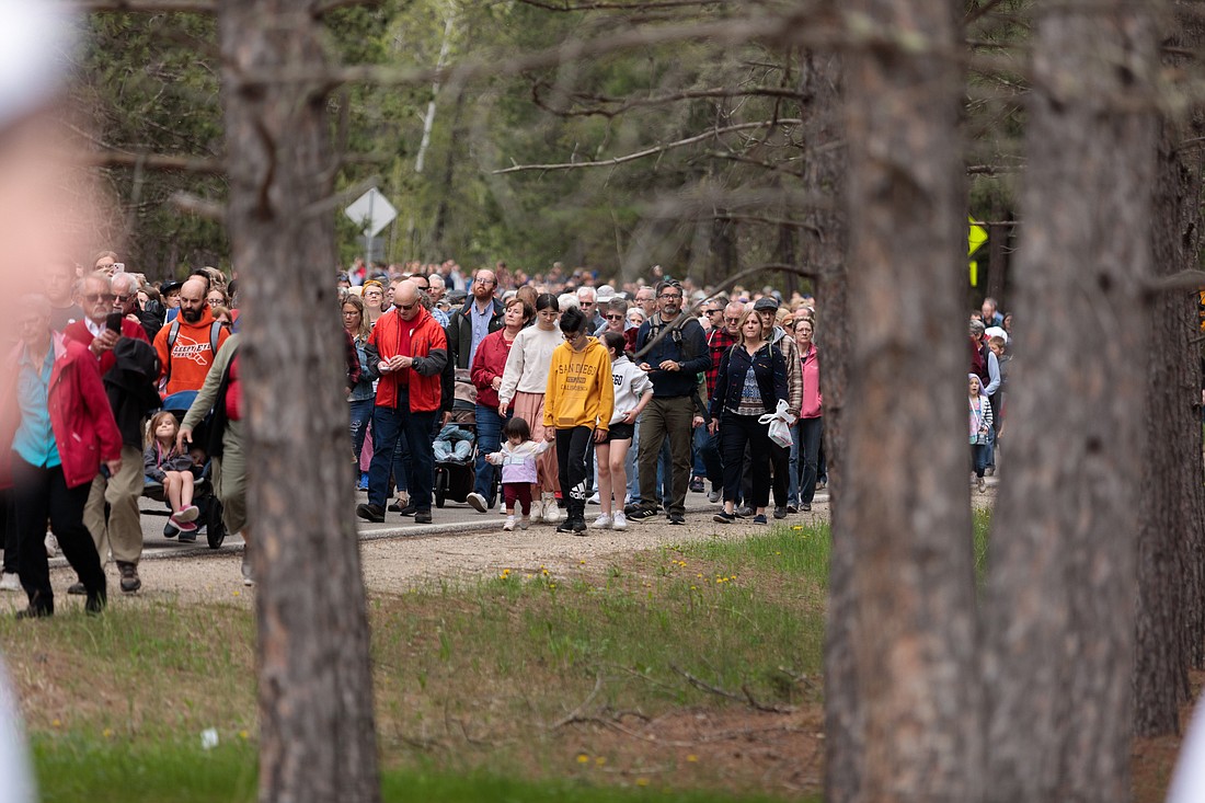 Pilgrims walk the mile-long Eucharistic procession to the headwaters of the Mississippi River May 19 for the launch of the Marian Route of the National Eucharistic Pilgrimage. (OSV News photo/Courtney Meyer)