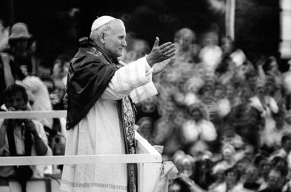 St. John Paul II greets throngs of Poles waiting for a glimpse of their native son at the monastery of Jasna Gora in Czestochowa during his 1979 trip to Poland. (OSV News photo/Chris Niedenthal)