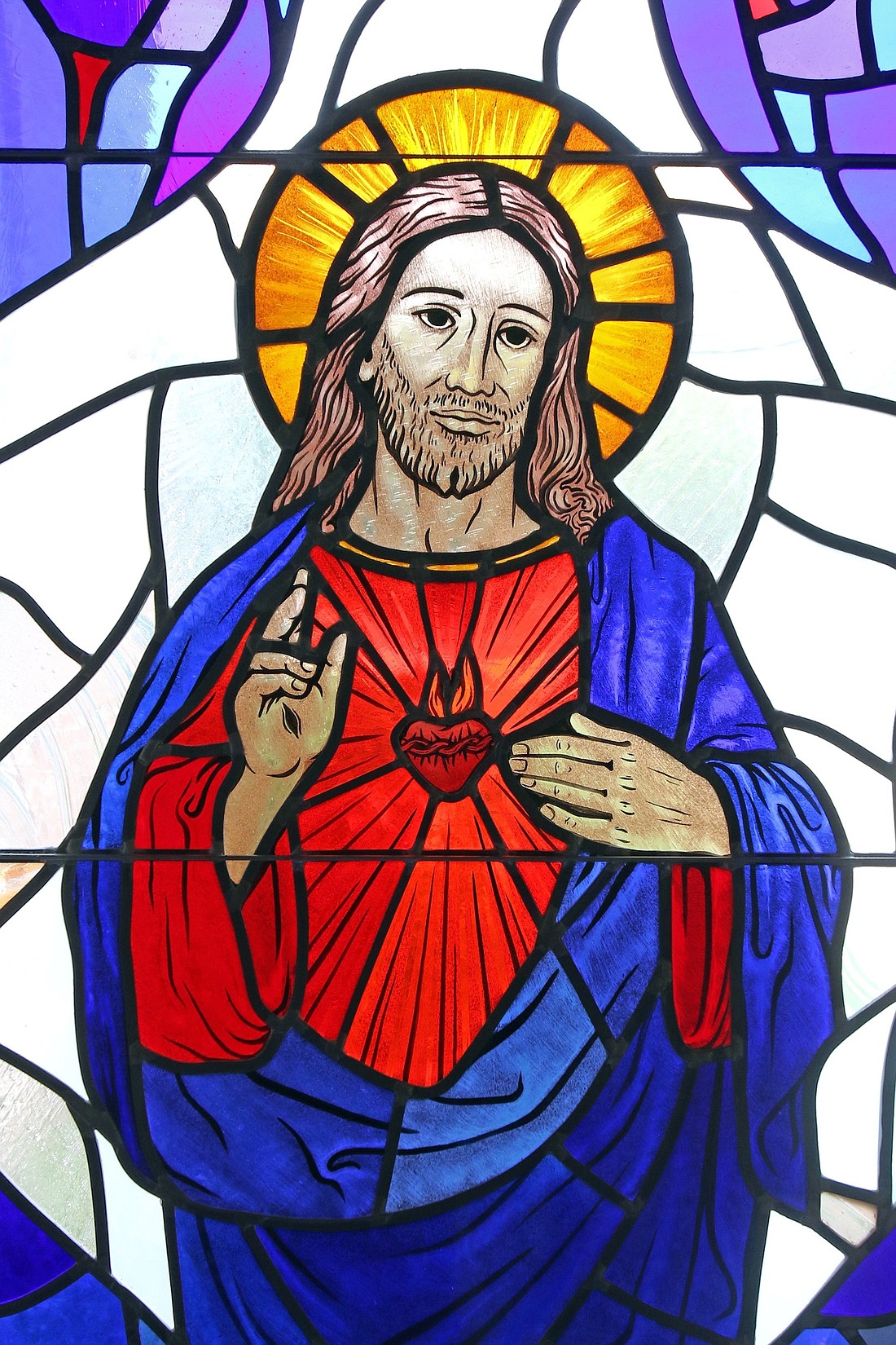 The Sacred Heart of Jesus is depicted in a stained-glass window at St. Patrick Church in Smithtown, N.Y. (OSV News photo/CNS file, Gregory A. Shemitz)