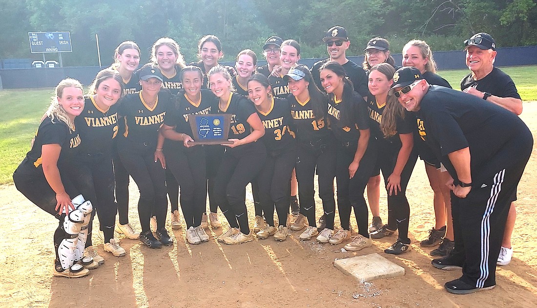 The St. John Vianney softball team shows off its plaque after take a 3-0 win at Notre Dame Jan. 3 in the NJSIAA South Jersey Non-Public A championship game. Rich Fisher photo