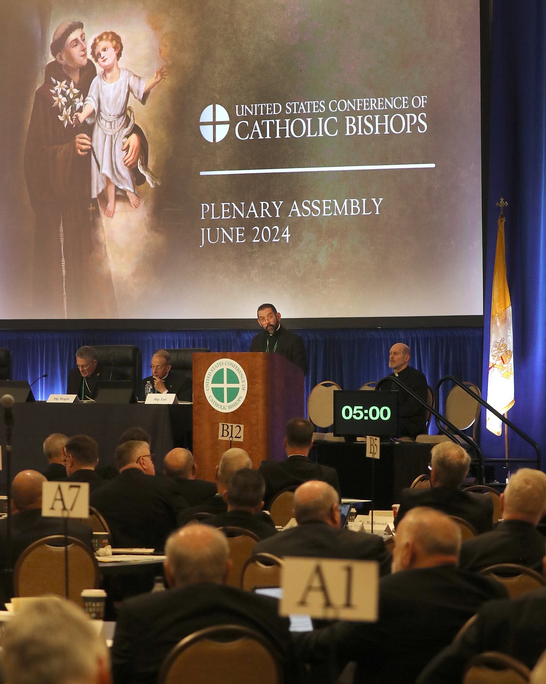 Bishop Daniel E. Flores of Brownsville, Texas, speaks June 13, 2024, at the U.S. Conference of Catholic Bishops' Spring Plenary Assembly in Louisville, Ky. (OSV News photo/Bob Roller)