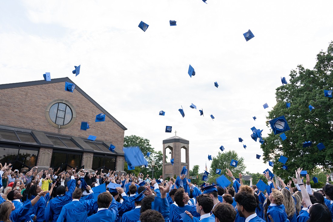 Class of 2024 grads of Donovan Catholic, Toms River, toss their caps in the air following graduation June 3.