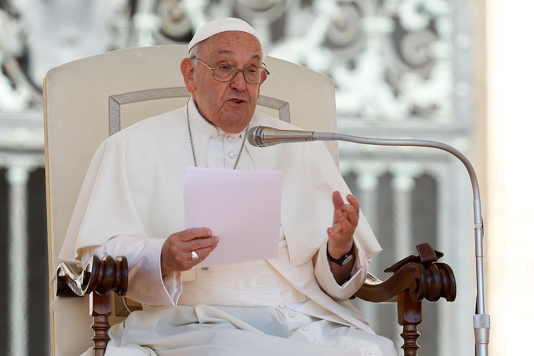 Pope Francis speaks to visitors in St. Peter's Square during his general audience at the Vatican June 5, 2024. (CNS photo/Lola Gomez)