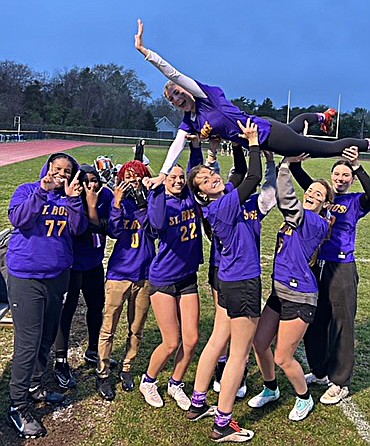 The St. Rose, Belmar, girls flag football team celebrates after their first big team win. Courtesy photo