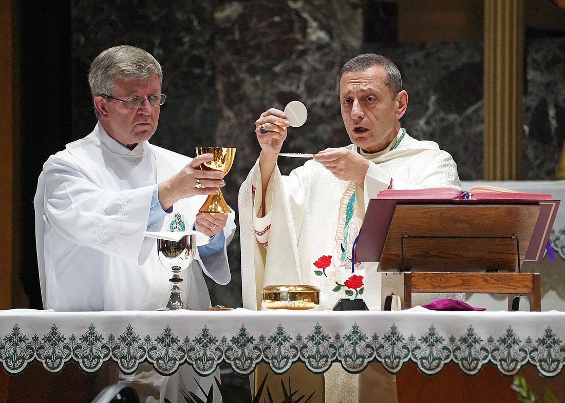 Bishop Frank J. Caggiano of Bridgeport, Conn., international chaplain of Rosary for Life, is assisted by Deacon Gerard J. Devine as he celebrates the annual Rosary for Life Mass Oct. 1, 2020, at Resurrection Church in Brooklyn, N.Y. (OSV News photo/Gregory A. Shemitz, CNS archive)